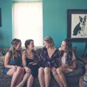 Bridal party relaxing on couch