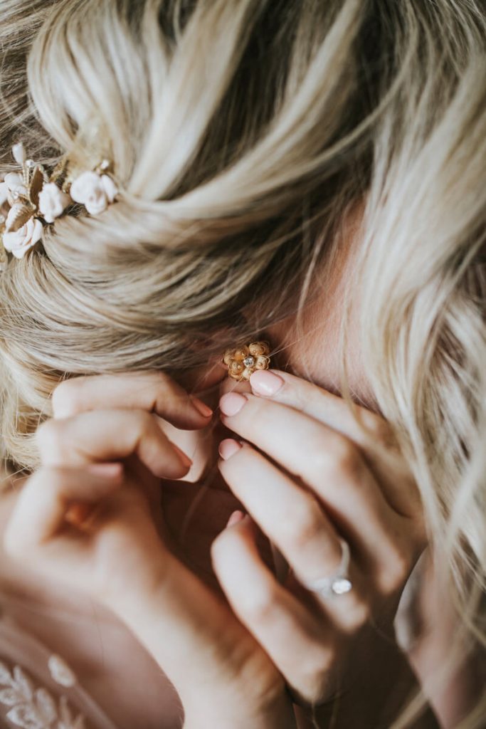 Gold floral earring, bride getting ready at Drumore Estate