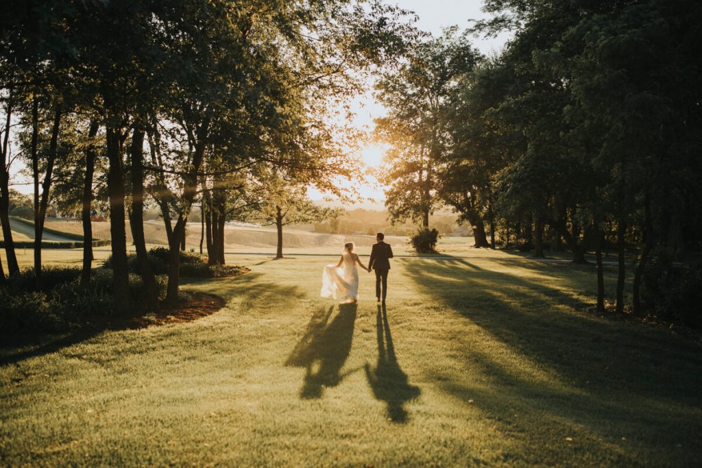 Bride & Groom walking into the sunset at Drumore Estate, Lancaster PA