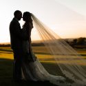 Bride's veil showcased with fields of Lancaster in the back