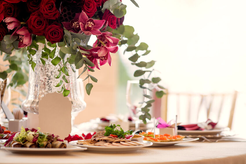 Table setting at a luxury wedding reception. Beautiful flowers