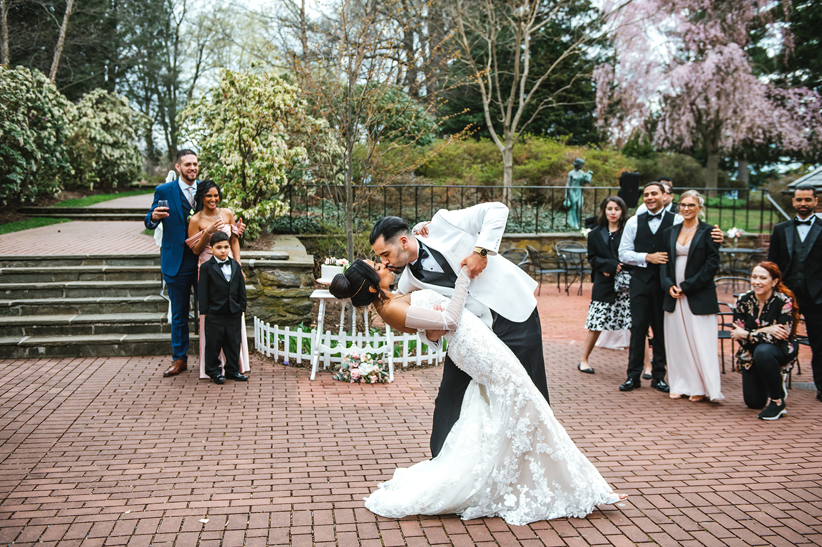 Bride and Groom kissing on the pathway on the grounds of Drumore Estate in Lancaster, PA